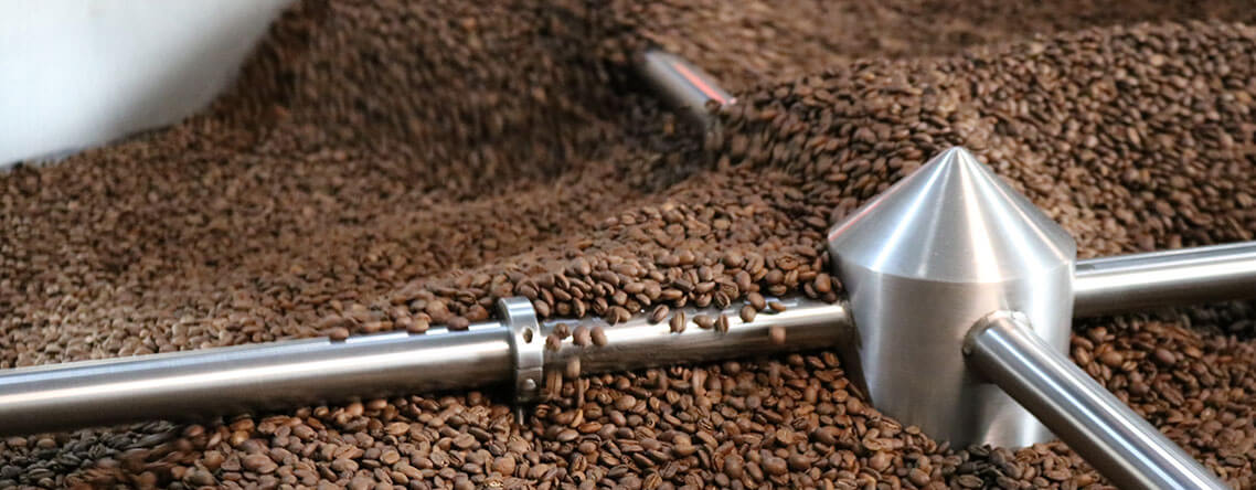 Coffee beans in roasting machinery
